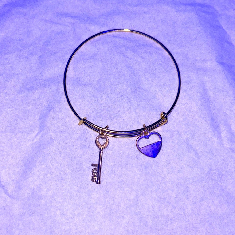 Bracelet, heart key on it , color is gold
